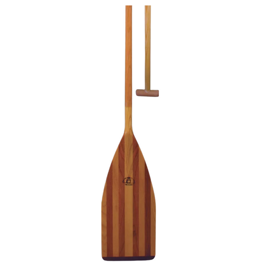 Heavy-duty Grey Owl Cox steering paddle with 9-inch wide laminated blade and maple barrel grip, designed for war canoe use